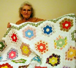 Bernice and the Grandmother's Flower Garden Raffle Quilt